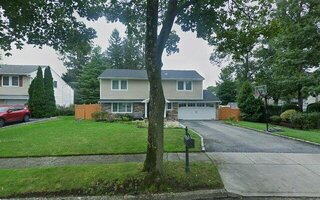 18 Suttonwood Dr, Commack, NY 11725