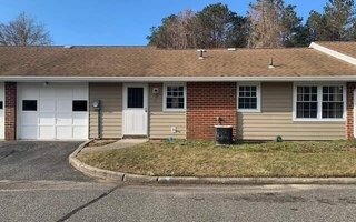 54 Aylesbury Ct #C, Ridge, NY 11961